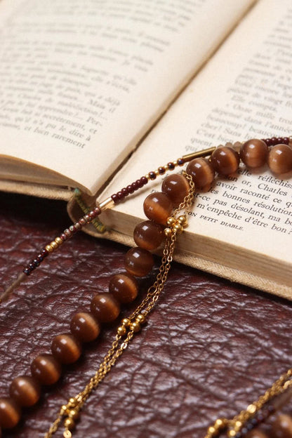 Brown cat eye snake necklace gold Label Kiki