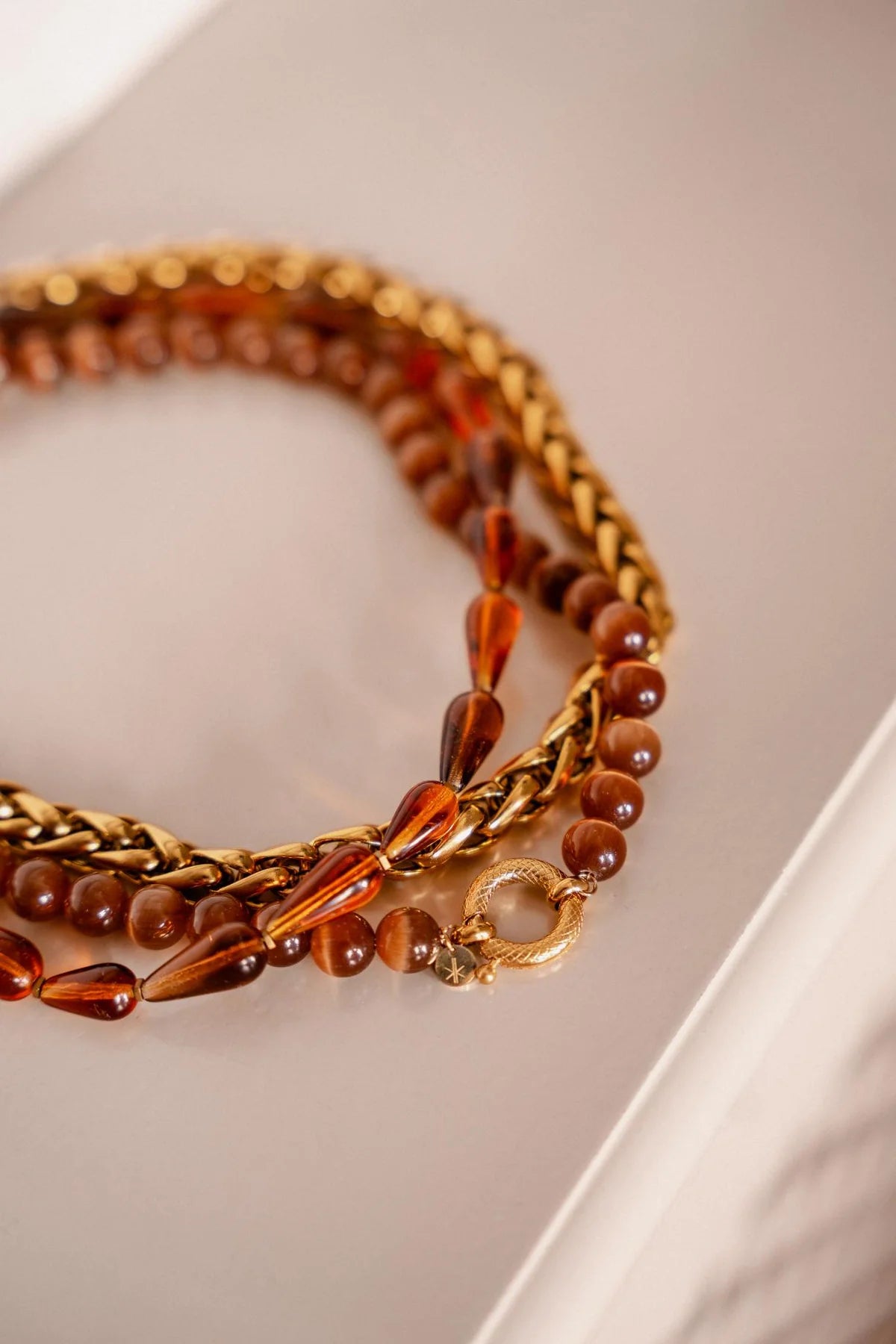 Bruine drup ketting goud Label kiki